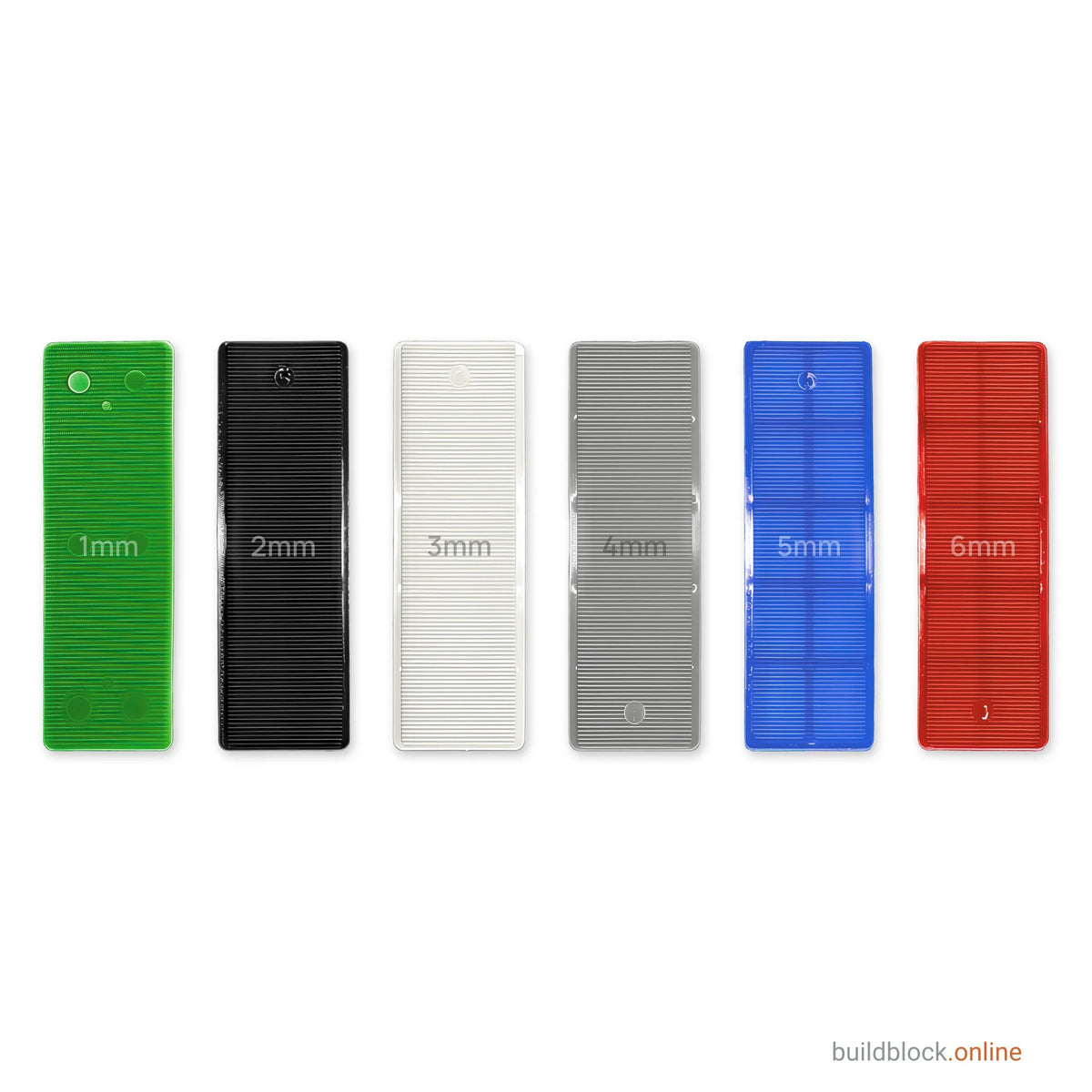 Six flat glazing packers, 1mm green to 6mm red, each marked with its thickness.