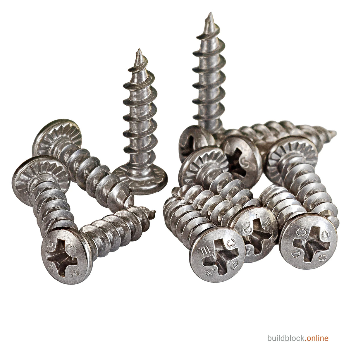 A group of 4.8mm x 20mm stainless steel window hinge repair screws on a white background, two standing on their points to show the coarse thread and the rest laid on their sides, with the serrated ribs under the pan heads and the pozidriv recess clearly visible.