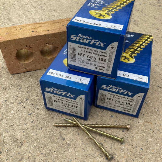 Boxes of Rapierstar StarFix 7.5mm masonry frame screws with loose screws on a house brick